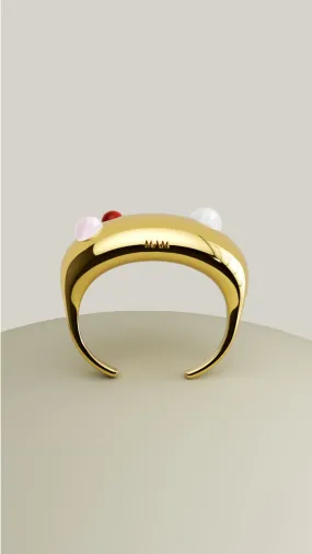 Gold statement bangle with stones