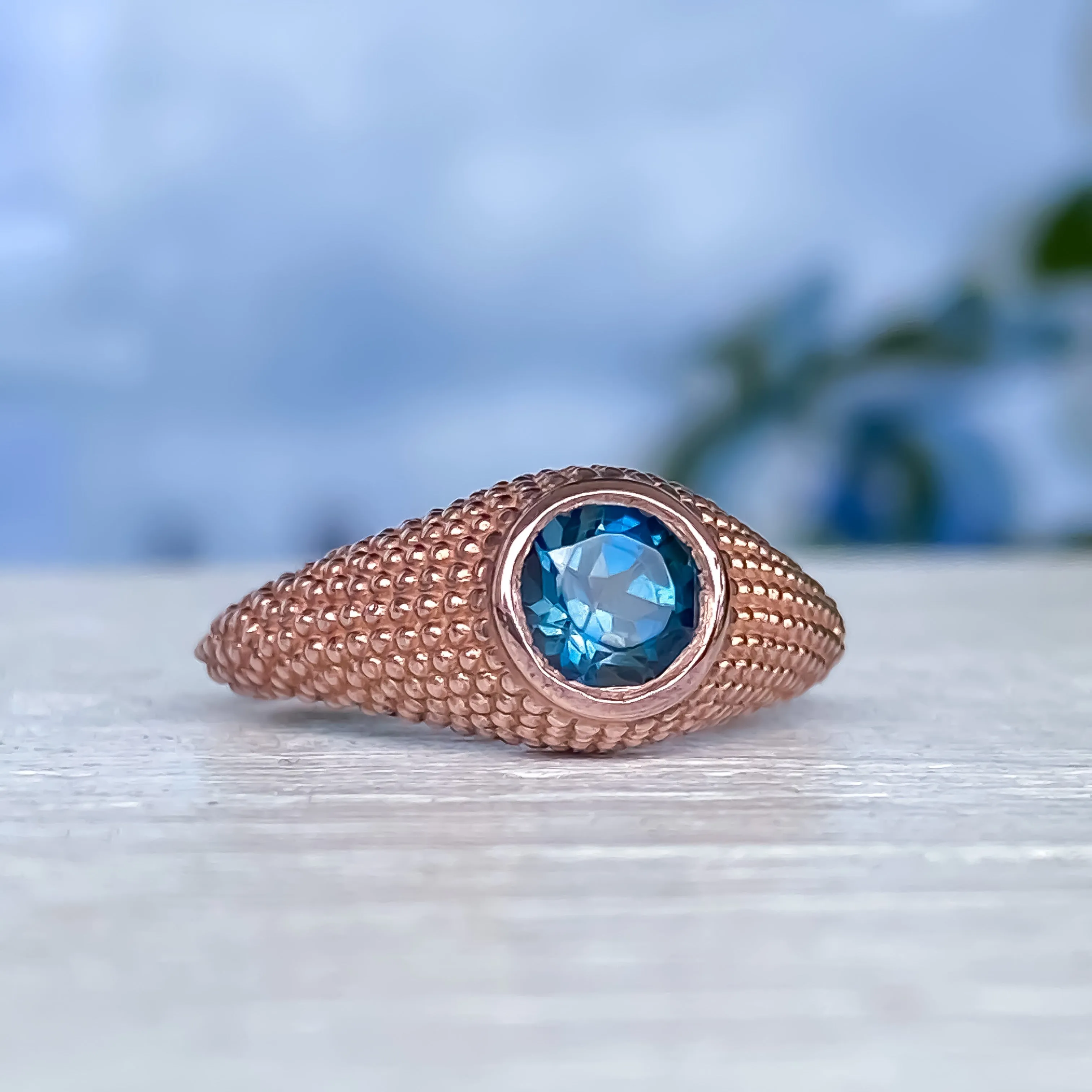 Nubia Round London Blue Topaz Rose Gold Ring Size 7US