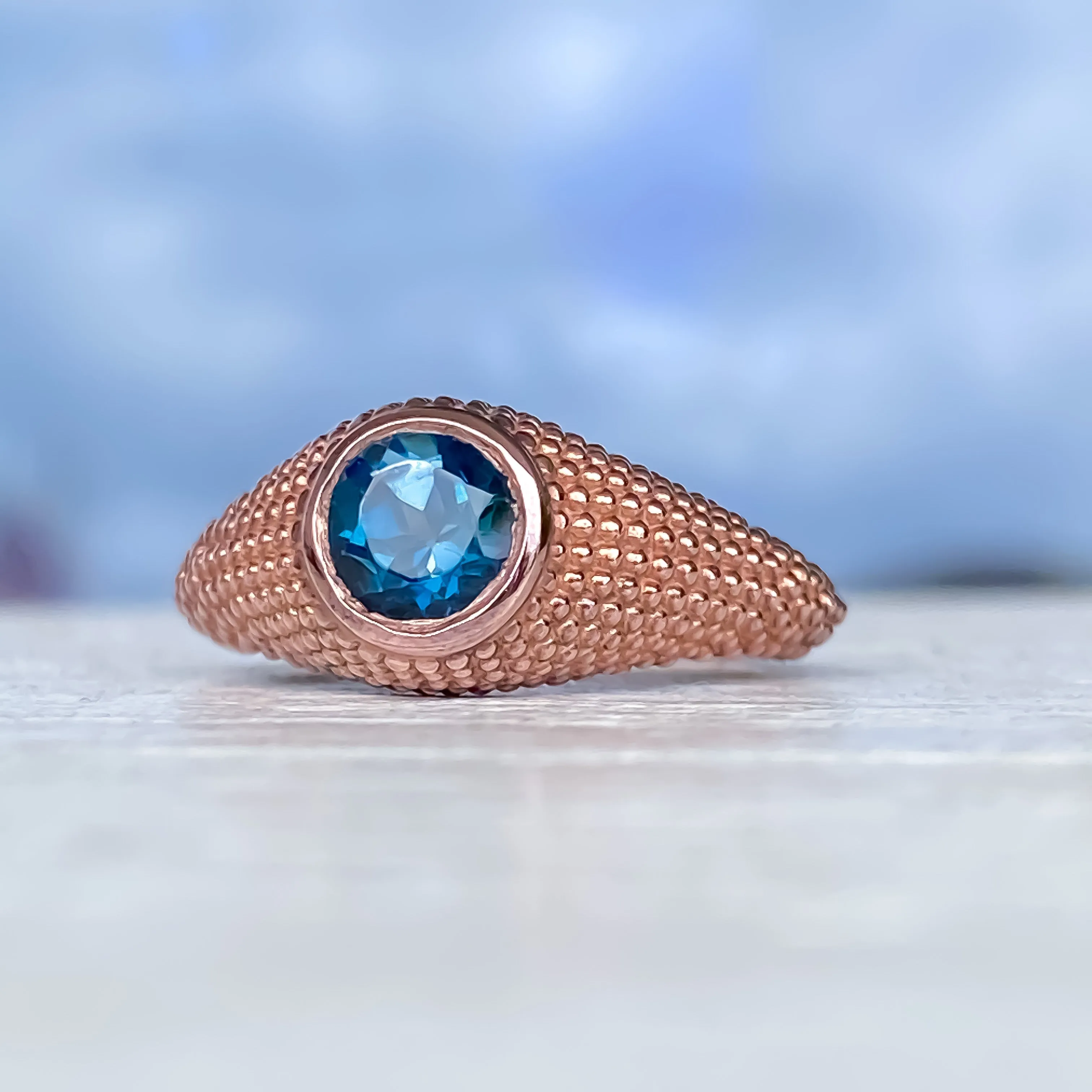 Nubia Round London Blue Topaz Rose Gold Ring Size 7US