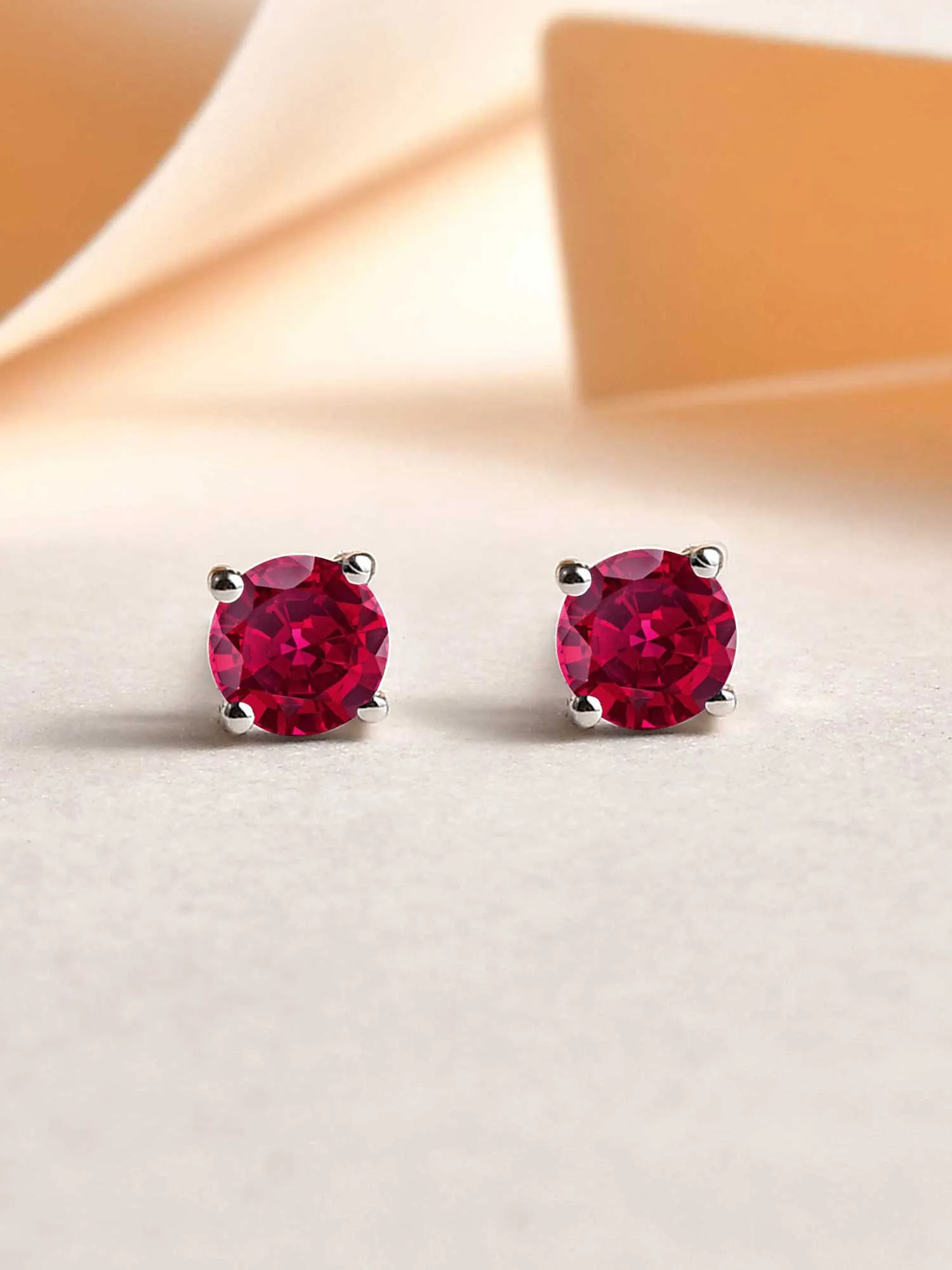 Red Ruby Half Carat Solitaire Stud Earrings For Women