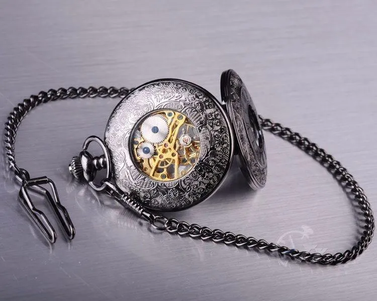 Roman Numeral Carvings on a Black Metal Pocket Watch